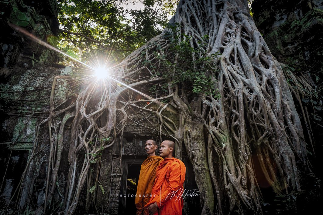 Monks at Ta Prohm gate_ Angkor_ Siem Reap_ C